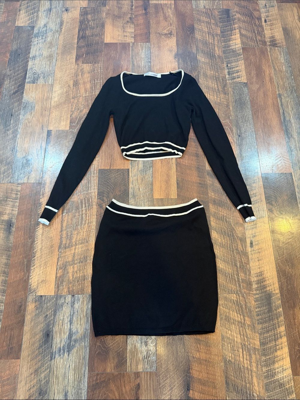 Women's Black Knit Two-Piece Skirt Set with White Trim 10 (1600)
Fits S/M